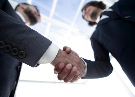 Shake on it. Handshake deal in federal market